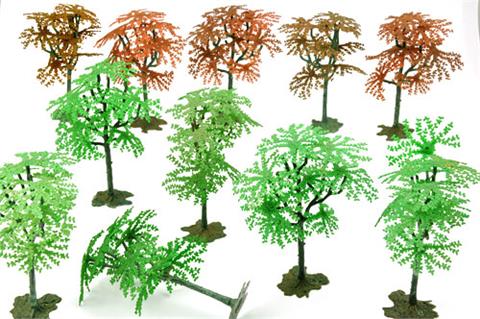 Konvolut 11 plastische Bäume